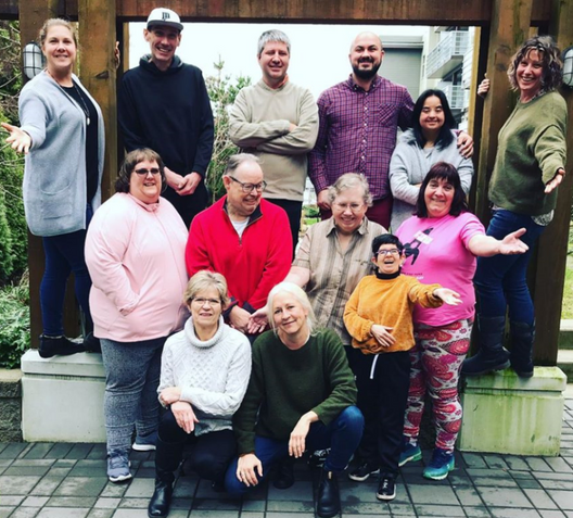 SALN members stand together, smiling for a group photo