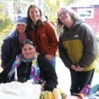 Participants at the Nelson Farmer’s Market celebrate Community Living Month.